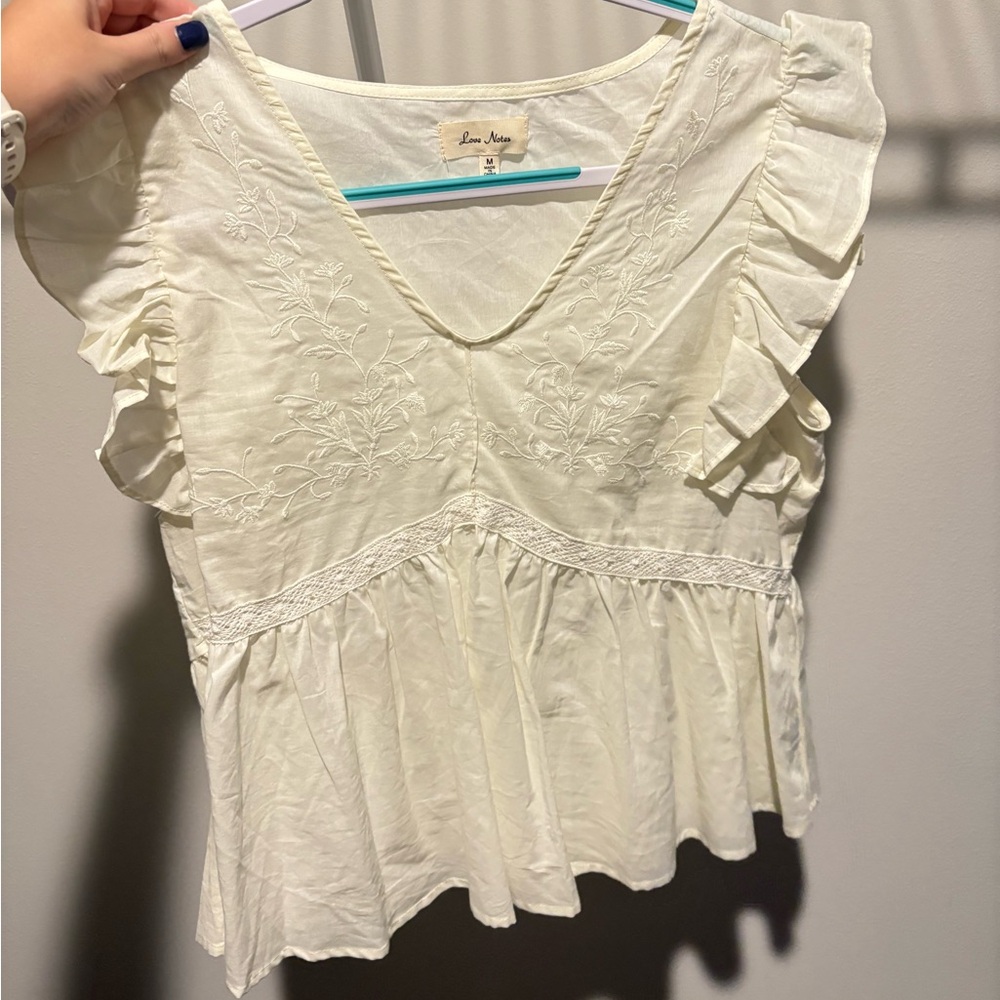 White Ruffled Blouse with Embroidery
